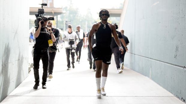 Colorado's QB Shedeur Sanders walks into the tunnel at Autzen Stadium.